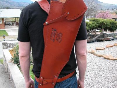 Rifle Scabbards Assorted And Some With Mounting Straps To Attach to What Ever You Ride. Horse Or Horse Powered Vehicle With Wheels. Custom, Full Grain Leather, Hand tooled, Hand made in the Okanagan, Oliver, B.C., Canada.